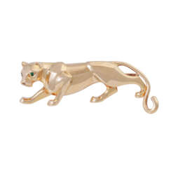 CARTIER brooch "Panther" with faceted emeralds,