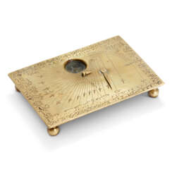 A BRASS QIBLA INDICATOR AND SUNDIAL