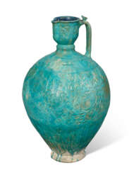 A MONUMENTAL MOULDED TURQUOISE-GLAZED POTTERY JUG