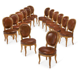 A SET OF FOURTEEN LOUIS XVI STYLE GILTWOOD DINING CHAIRS