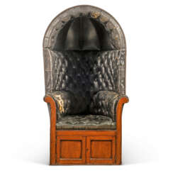 AN EDWARDIAN MAHOGANY AND DEEP-BUTTONED BLACK LEATHER-UPHOLSTERED HALL PORTER'S CHAIR