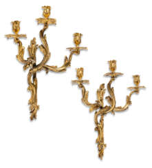 A PAIR OF LOUIS XV ORMOLU THREE-BRANCH WALL-LIGHTS