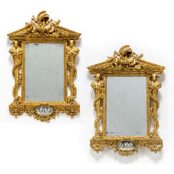 A PAIR OF NORTH ITALIAN GILTWOOD AND REVERSE-GLASS PAINTED MIRRORS