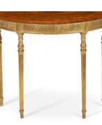 Mayhew & Ince. A GEORGE III GILTWOOD, SATINWOOD, SYCAMORE, AND MARQUETRY-INLAID DEMI-LUNE SIDE TABLE