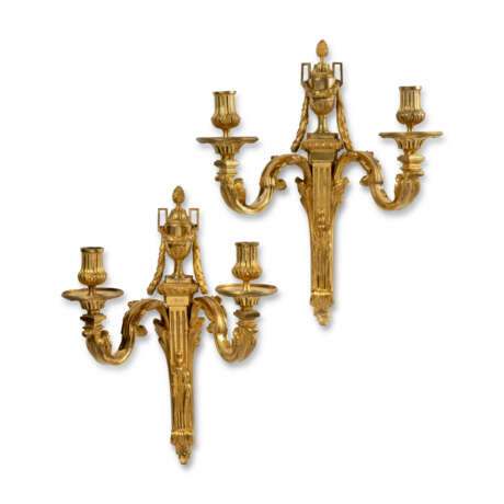 A PAIR OF LOUIS XVI ORMOLU TWO-BRANCH WALL-LIGHTS - photo 1