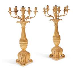 A PAIR OF ITALIAN GILTWOOD SEVEN-BRANCH CANDELABRA