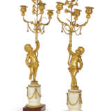 A PAIR OF ORMOLU, WHITE MARBLE AND ROUGE GRIOTTE THREE-LIGHT CANDELABRA - photo 1