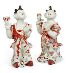 A PAIR OF JAPANESE EXPORT PORCELAIN BOYS