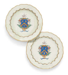 A PAIR OF WORCESTER PORCELAIN ARMORIAL PLATES FROM THE CALMADY SERVICE