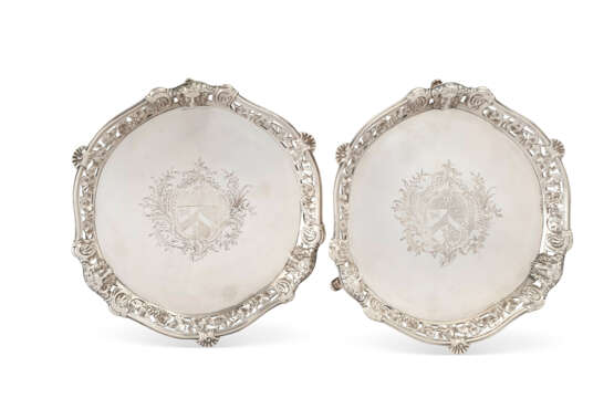 A PAIR OF GEORGE II SILVER SALVERS - фото 1