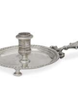 A QUEEN ANNE SILVER CHAMBER CANDLESTICK