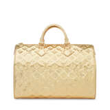 A LIMITED EDITION METALLIC GOLD MIRROR MONOGRAM VINYL SPEEDY 35 WITH GOLD HARDWARE - photo 1