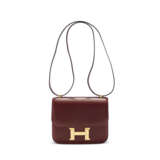 A ROUGE H CALFBOX LEATHER MINI CONSTANCE 18 WITH GOLD HARDWARE - фото 1