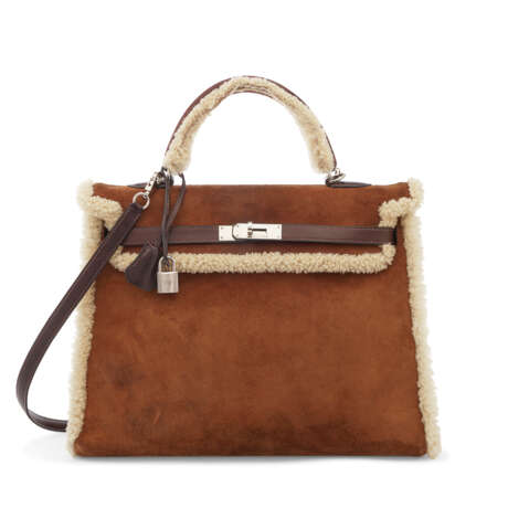 A LIMITED EDITION FAUVE VEAU DOBLIS & ÉBÈNE BARÉNIA SHEARLING RETOURNÉ KELLY 35 WITH PALLADIUM HARDWARE - photo 1