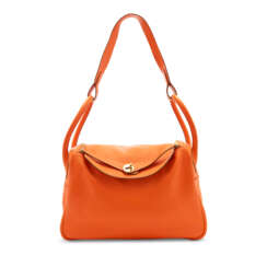 AN ORANGE H EVERGRAIN LEATHER LINDY 34 WITH GOLD HARDWARE