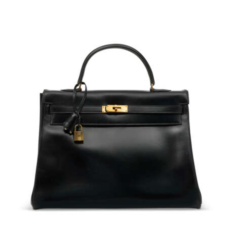 A BLACK CALF BOX LEATHER RETOURNÉ KELLY 35 WITH GOLD HARDWARE - Foto 2