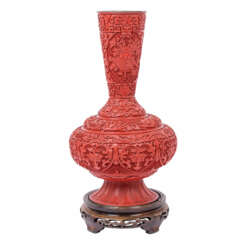 Red carved lacquer vase. CHINA, 20th c.