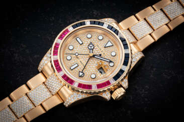 ROLEX, GMT-MASTER II REF. 116578 ‘SARU’, AN ATTRACTIVE GOLD, RUBY, SAPPHIRE AND DIAMOND-SET DUAL TIME AUTOMATIC WRISTWATCH