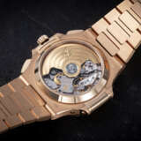 PATEK PHILIPPE, NAUTILUS REF. 5980/1R-001, A GOLD AUTOMATIC CHRONOGRAPH WRISTWATCH - фото 2