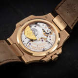 PATEK PHILIPPE, NAUTILUS REF. 5712R-001, A GOLD AUTOMATIC WRISTWATCH WITH MOON-PHASE AND POWER RESERVE - photo 2