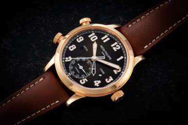 PATEK PHILIPPE, CALATRAVA TRAVEL TIME REF. 7234R-001, A GOLD AUTOMATIC DUAL TIME WRISTWATCH