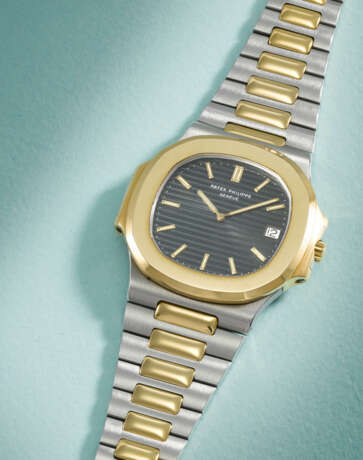 PATEK PHILIPPE. A VERY RARE 18K GOLD AND STAINLESS STEEL AUTOMATIC WRISTWATCH WITH DATE AND BRACELET - Foto 2