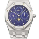 AUDEMARS PIGUET. A COVETED AND ATTRACTIVE STAINLESS STEEL AUTOMATIC PERPETUAL CALENDAR WRISTWATCH WITH MOON PHASES, LEAP YEAR INDICATION, `SAPPHIRE BLUE` DIAL AND BRACELET - фото 1