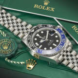 ROLEX. A STAINLESS STEEL AUTOMATIC DUAL TIME WRISTWATCH WITH SWEEP CENTRE SECONDS, DATE AND BRACELET - photo 3