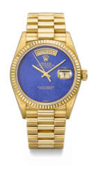 ROLEX. A RARE AND ATTRACTIVE 18K GOLD AUTOMATIC WRISTWATCH WITH SWEEP CENTRE SECONDS, DAY, DATE, LAPIS LAZULI DIAL AND BRACELET