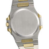PATEK PHILIPPE. A VERY RARE AND ELEGANT 18K GOLD AND STAINLESS STEEL AUTOMATIC WRISTWATCH WITH DATE AND BRACELET - Foto 3