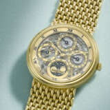 AUDEMARS PIGUET. AN ATTRACTIVE 18K GOLD AUTOMATIC SKELETONIZED PERPETUAL CALENDAR WRISTWATCH WITH MOON PHASES AND BRACELET - photo 2