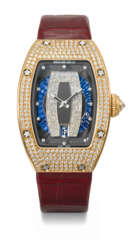 RICHARD MILLE. A LADY&#39;S RARE AND ELEGANT 18K PINK GOLD AND DIAMOND-SET AUTOMATIC SEMI-SKELETONIZED WRISTWATCH WITH DATE