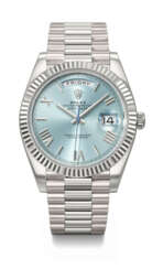 ROLEX. A RARE AND HEAVY PLATINUM AND AUTOMATIC WRISTWATCH WITH SWEEP CENTRE SECONDS, DAY, DATE AND BRACELET