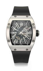 RICHARD MILLE. A RARE AND COVETED TITANIUM AUTOMATIC SEMI-SKELETONIZED WRISTWATCH WITH SWEEP CENTRE SECONDS AND DATE