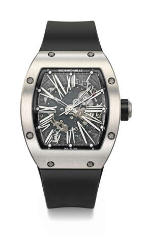 RICHARD MILLE. A RARE AND COVETED TITANIUM AUTOMATIC SEMI-SKELETONIZED WRISTWATCH WITH SWEEP CENTRE SECONDS AND DATE - photo 1