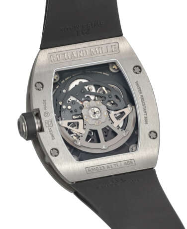 RICHARD MILLE. A RARE AND COVETED TITANIUM AUTOMATIC SEMI-SKELETONIZED WRISTWATCH WITH SWEEP CENTRE SECONDS AND DATE - фото 4