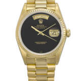 ROLEX. A RARE AND ATTRACTIVE 18K GOLD AUTOMATIC WRISTWATCH WITH SWEEP CENTRE SECONDS, DAY, DATE, ONYX DIAL AND BRACELET - photo 1