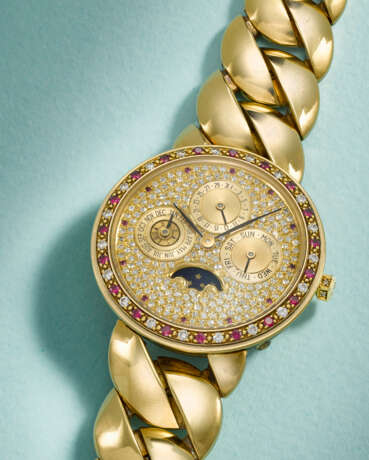 OMEGA. A POSSIBLY UNIQUE AND ATTRACTIVE 18K GOLD, DIAMOND AND RUBY-SET AUTOMATIC PERPETUAL CALENDAR WRISTWATCH WITH MOON PHASES AND BRACELET - Foto 2