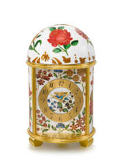 PATEK PHILIPPE. A UNIQUE AND HIGHLY ATTRACTIVE PORCELAIN AND GILT BRASS DOME TABLE CLOCK WITH CLOISONN&#201; ENAMEL DEPICTING FLOWERS AND FOLIAGES
