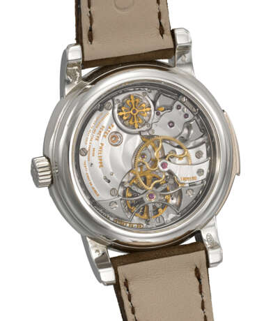 PATEK PHILIPPE. A RARE AND HIGHLY IMPORTANT PLATINUM MINUTE REPEATING PERPETUAL CALENDAR WRISTWATCH WITH TOURBILLON, RETROGRADE DATE, MOON PHASES, LEAP YEAR INDICATION AND BREGUET NUMERALS - photo 4