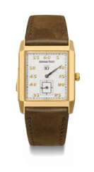 AUDEMARS PIGUET. A RARE AND ELEGANT 18K GOLD RECTANGULAR MINUTE REPEATING JUMP HOUR WRISTWATCH