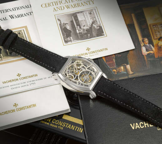 VACHERON CONSTANTIN. AN ATTRACTIVE AND ELEGANT PLATINUM TONNEAU-SHAPED SKELETONIZED TOURBILLON WRISTWATCH WITH POWER RESERVE AND DATE - photo 3