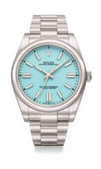ROLEX. AN ATTRACTIVE STAINLESS STEEL AUTOMATIC WRISTWATCH WITH SWEEP CENTRE SECONDS, BRACELET AND TURQUOISE BLUE DIAL