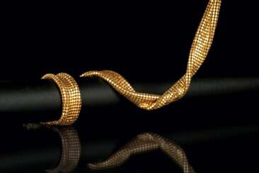 Juwelier Wilm. Gold-Collier und Armband 'Pharao'.
