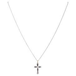 Cross pendant with sapphires and diamonds