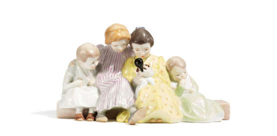 Four children with doll - фото 1