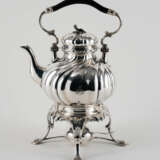 Large teapot with twisted features on rechaud - photo 1