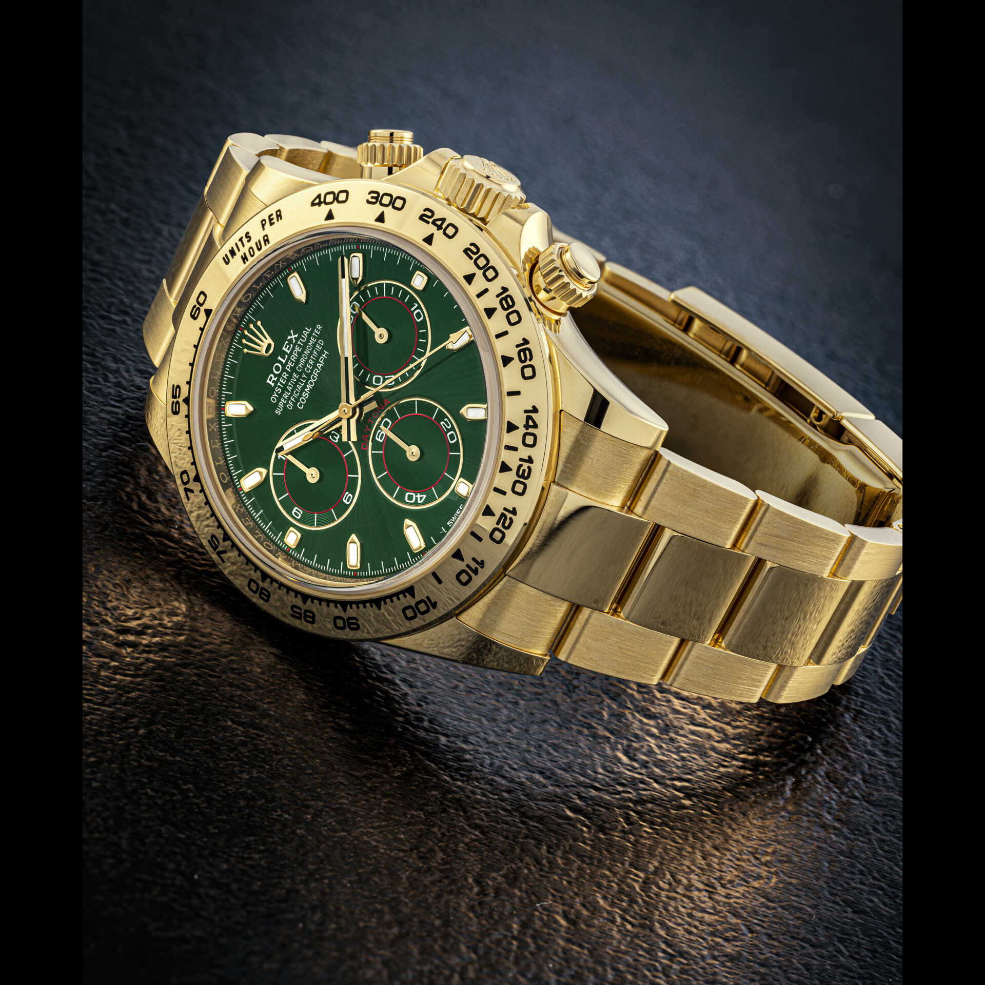 ROLEX. AN 18K GOLD AUTOMATIC CHRONOGRAPH WRISTWATCH WITH BRACELET AND GREEN DIAL