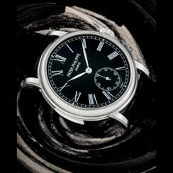 PATEK PHILIPPE. A POSSIBLY UNIQUE AND IMPORTANT PLATINUM AUTOMATIC MINUTE REPEATING WRISTWATCH WITH BLACK ENAMEL DIAL