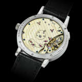 A. LANGE & S&#214;HNE. A RARE PLATINUM LIMITED EDITION SEMI-SKELETONISED WRISTWATCH WITH LARGE DATE AND POWER RESERVE - photo 2